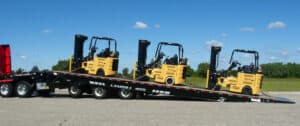 landoll sliding trailer with forklifts