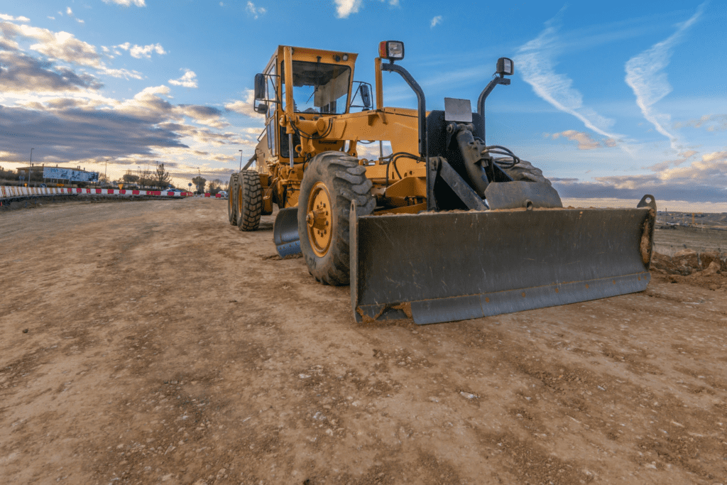 transporting a motor grader