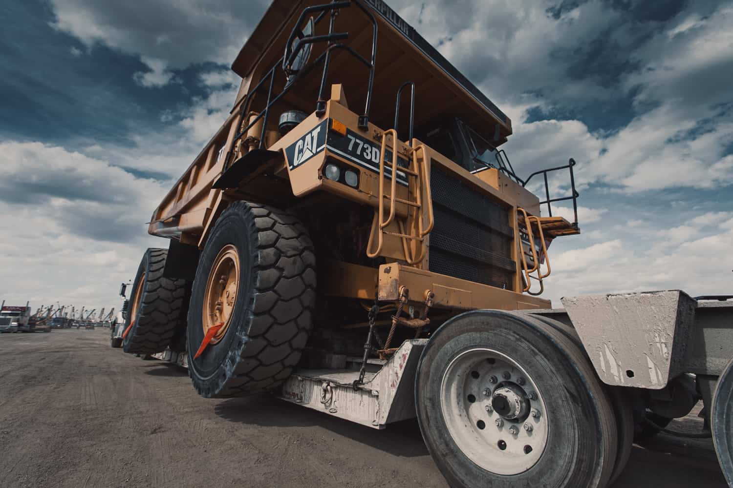 offroad dump truck on trailer