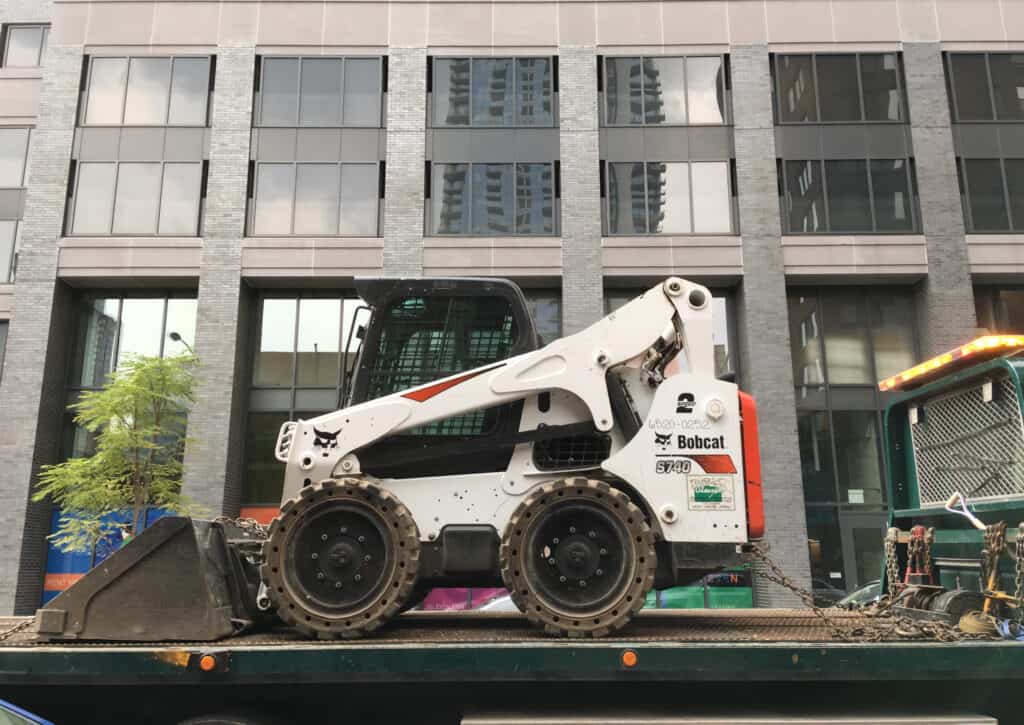 bobcat skid steer on trailer