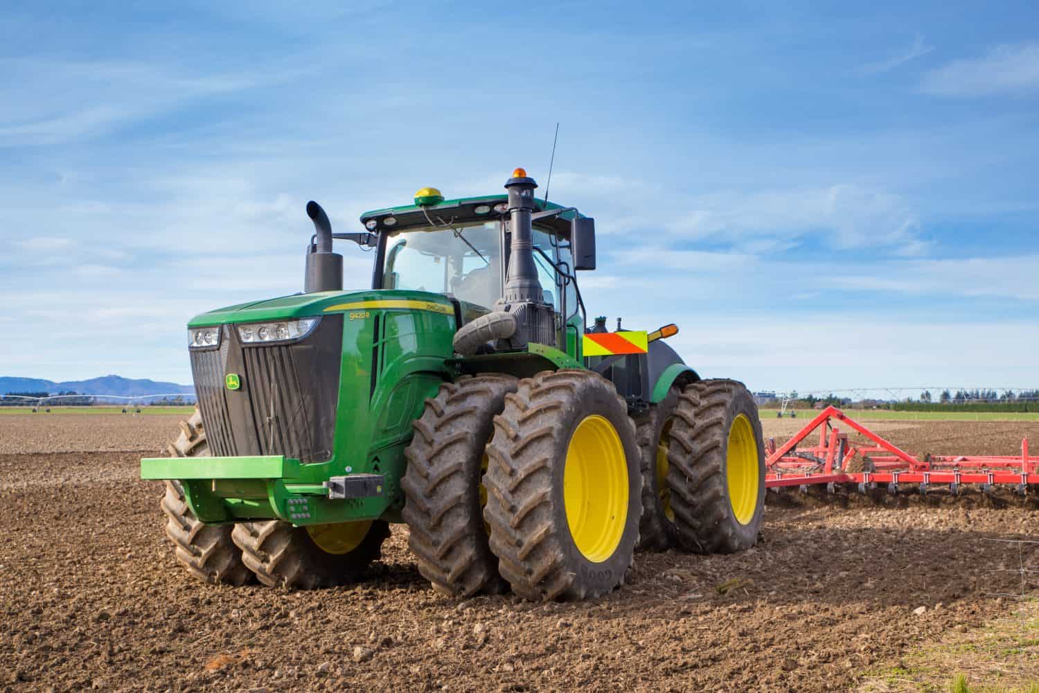 john deere tractor with plow